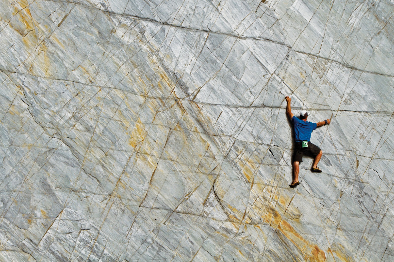 haast_wallclimb Jamie Vinton-Boot explores a seemingly blank wall of schist on the Eye Tooth slabs at the head of the Otoko Valley. The level of concentration required when climbing without ropes can alter one’s mental state. The surrounding environment, and even an appreciation of time, is lost to the minutiae of tasks before the climber. Far from the misconception that climbers are adrenaline junkies, traversing a wall such as this requires precision, concentration and judgment far beyond that employed in everyday life.
