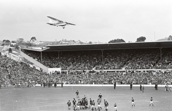 Negative S.447 Marx Jones flies a Cessna aircraft low over Eden Park in an attempt to stop the All Blacks v Springboks third and final rugby test match.